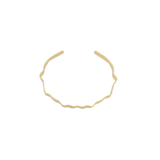 Alaya Small Wave Cuff bracelet. Gold plated. Dansk Copenhagen
