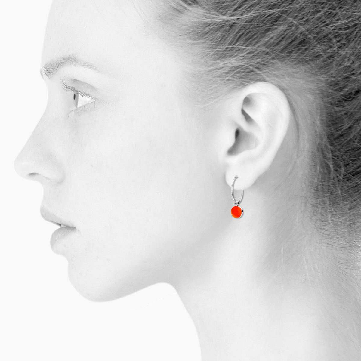 Sign creol earrings. Neon orange. Sterling silver. Scherning Copenhagen