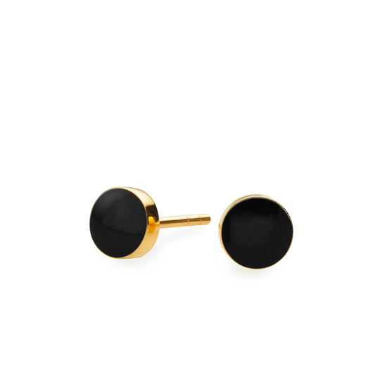 Sign earrings for him and her. Black and gold. Gold-plated sterling silver. Scherning Copenhagen